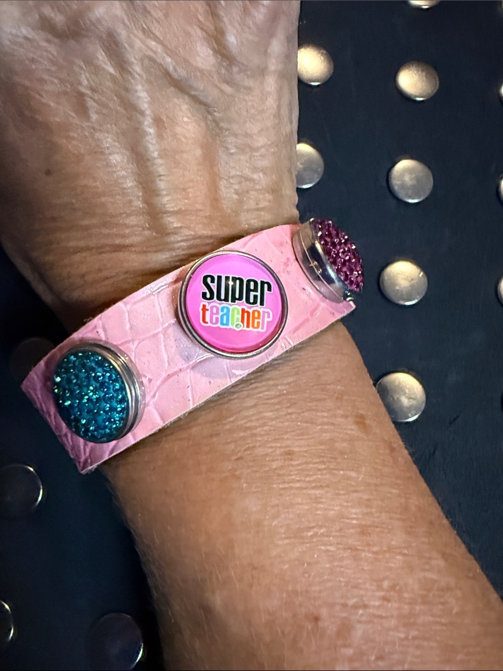 Pink leather 3 snap bracelet with snaps